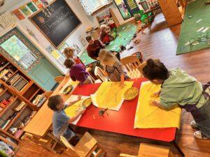 3School students painting with yarn during Y week.